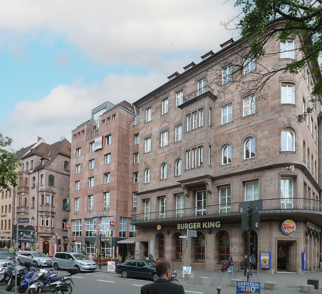 Historic brick buildings, on the first floor gastronomy